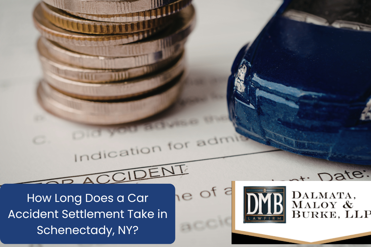 car accident claim form, stack of coins, toy car - a concept of car accident settlement